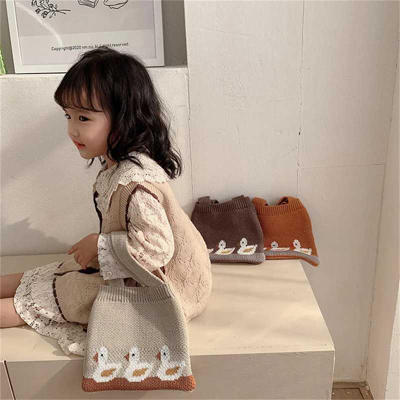 2024 Girl Childrens Handbag Cute Duck Knitted Small Bag Spring Childrens Bag Portable Handbag Coin Snack Storage Bag W240813