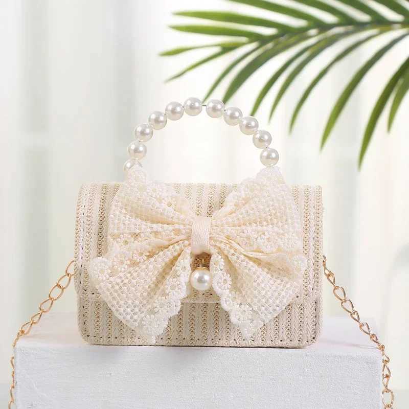 Cute lace bow flower childrens grass shoulder bag simple pearl mini handbag fashionable princess coin wallet womens messenger bag W240813