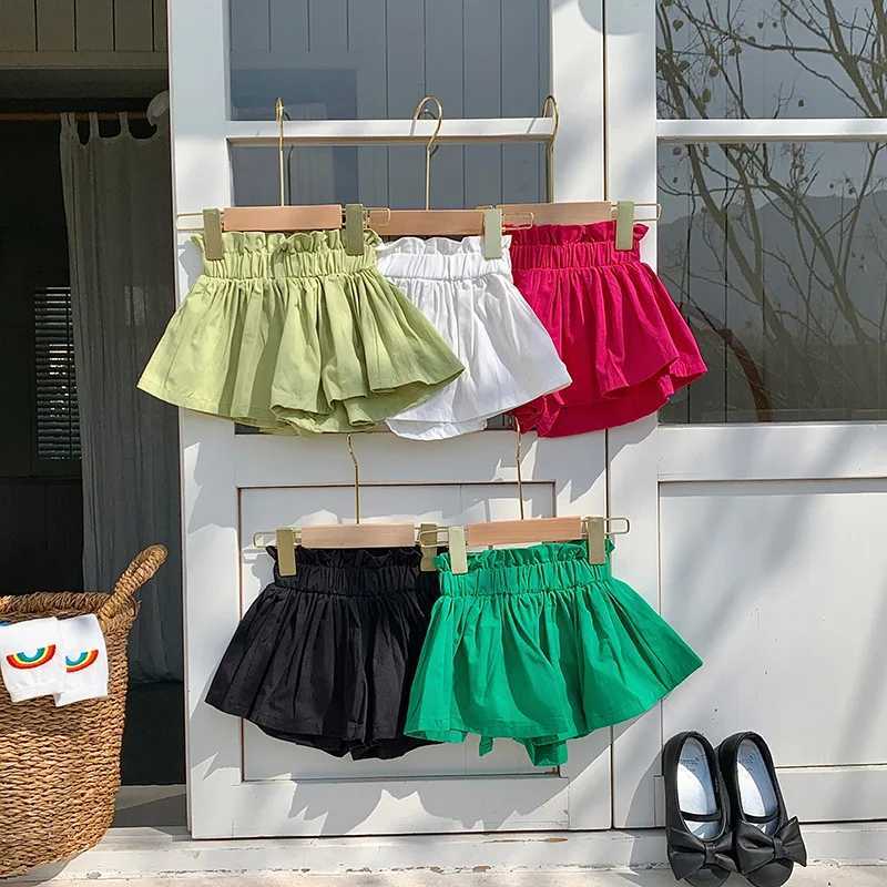 Girls shorts 2024 new summer Korean style pleated hem pants solid color petal pants childrens split style W240813