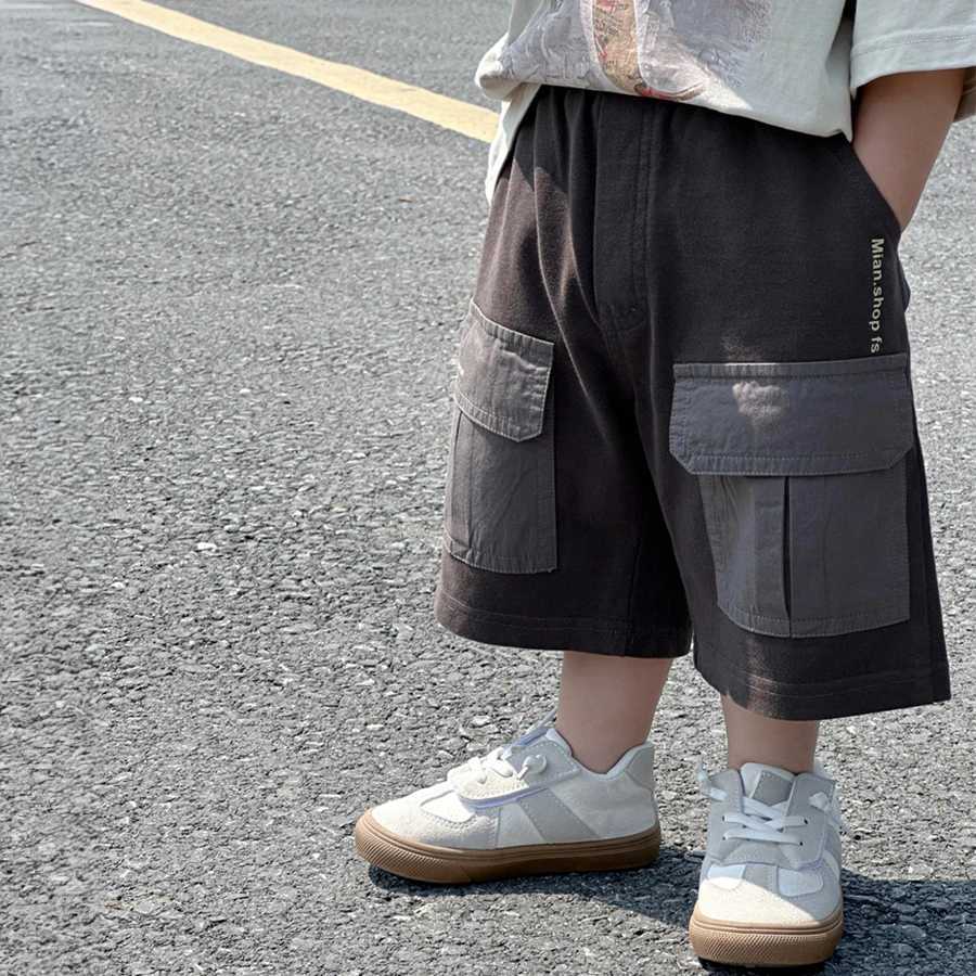 Boys summer tight fitting Korean version childrens large pocket shorts boys treasure pants street trend childrens summer clothing W240813