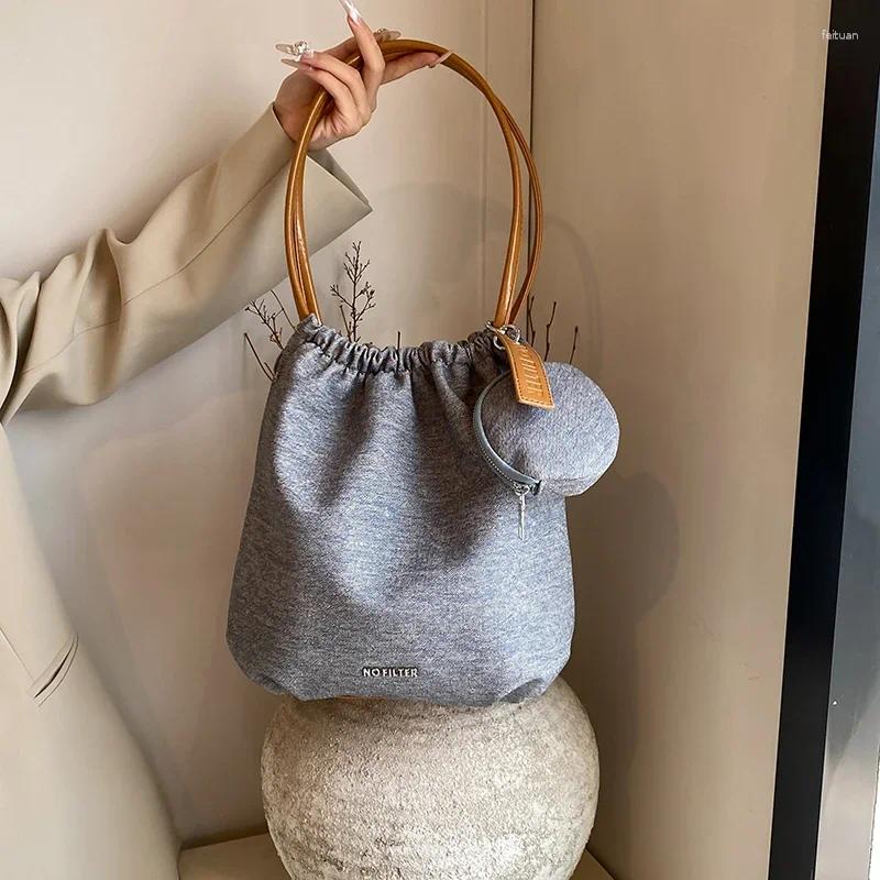 2025 new shoulder bags large capacity retro denim blue soft leather bag single womens tote niche design korean version handheld zhanyishengli