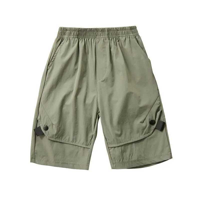 Boys shorts childrens solid color Trouser with button teenagers pocket shorts 2024 summer casual clothing for children aged 3 to 12 W240813