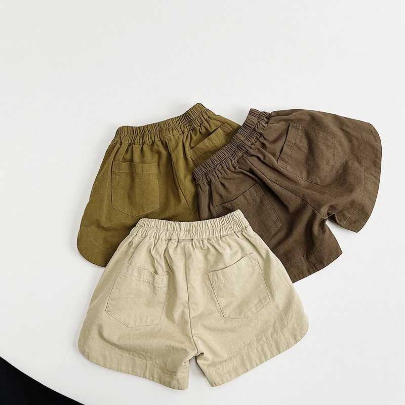 Summer Children Shorts 1-8Y Boys Girls Cotton Daily Shorts Solid Color Casual Mens Clothing Korean Preschool Clothing Childrens Clothing 2024 New Edit