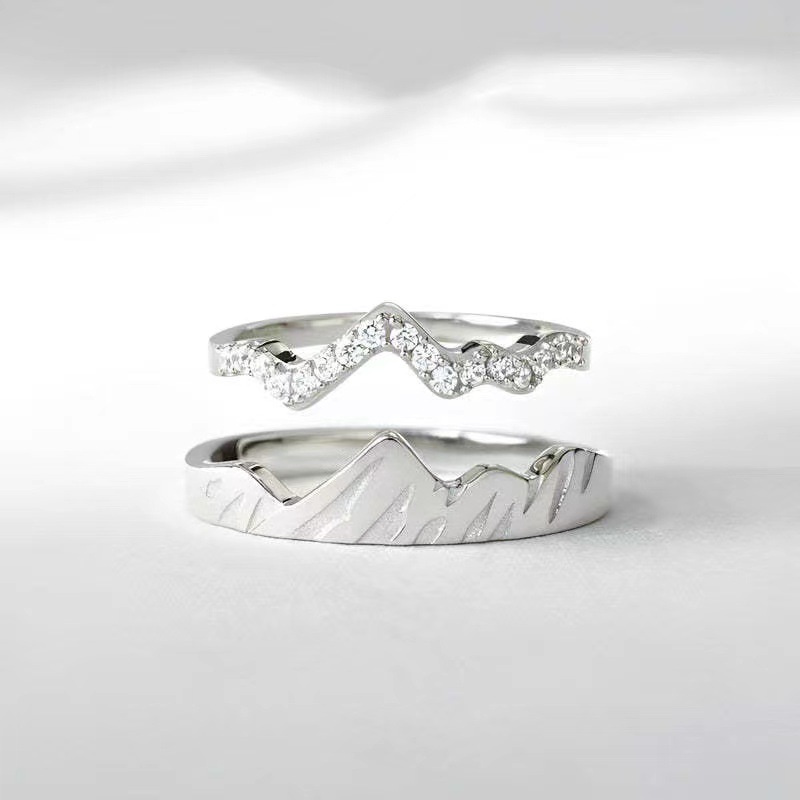 Love ring copper inlaid zircon personality peak design water wave ring Europe and the United States fashion couple set ring