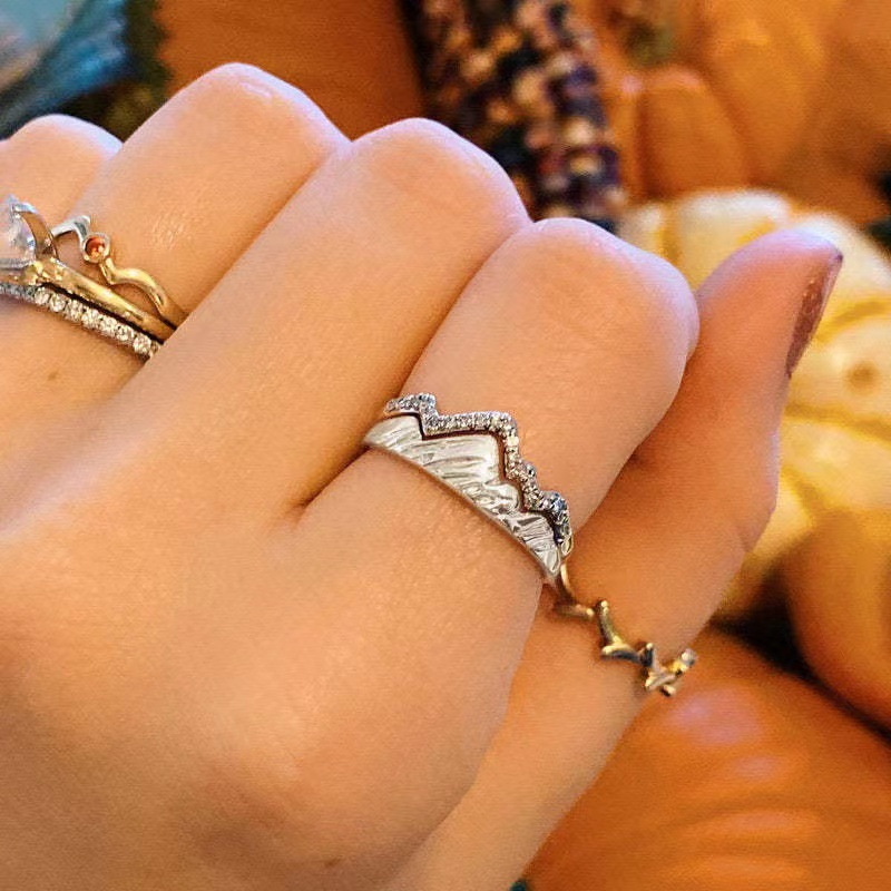 Love ring copper inlaid zircon personality peak design water wave ring Europe and the United States fashion couple set ring