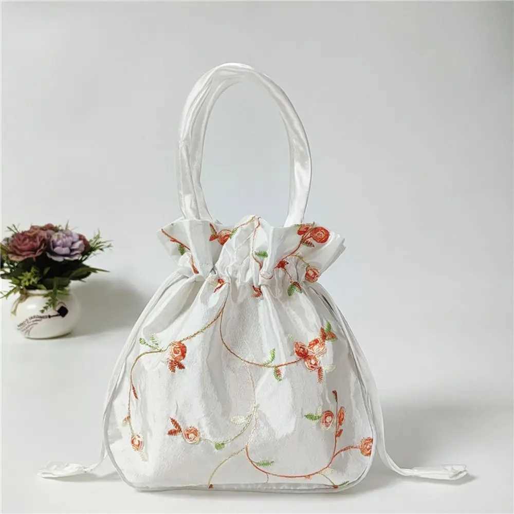 New retro embroidered silk drawstring handbag storage bag Hanfu womens wallet jewelry packaging bag card holder W240813