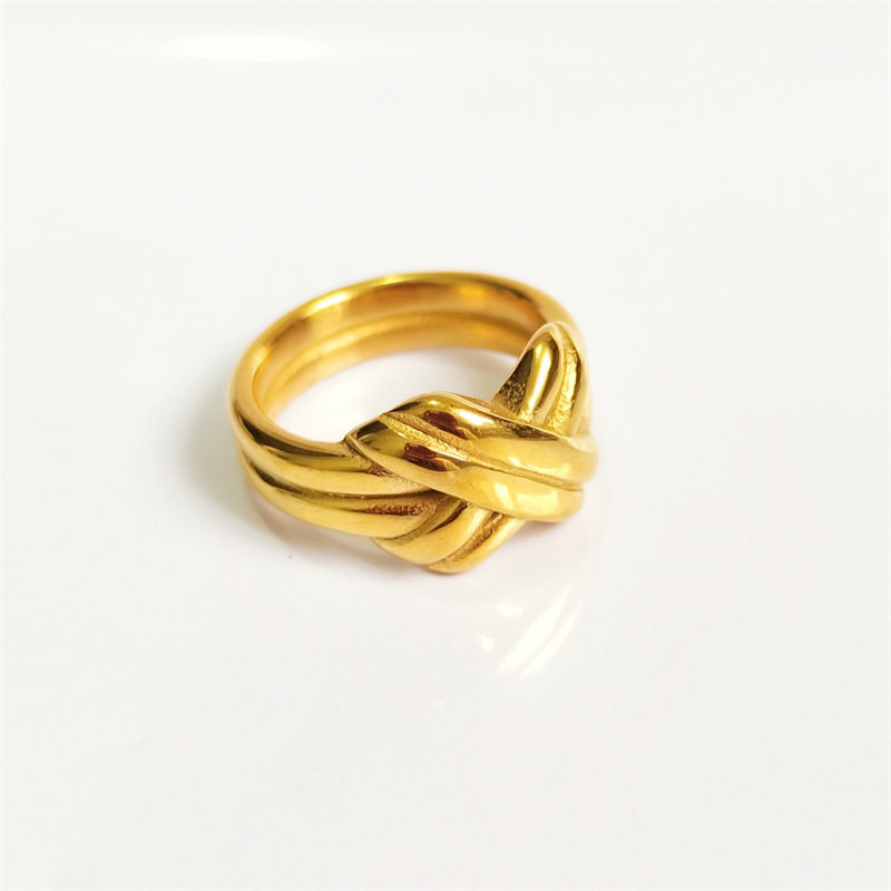 Designer ring stainless steel embossed hollow ins niche cold wind notch irregular wide face female ring surface plating 18K real gold