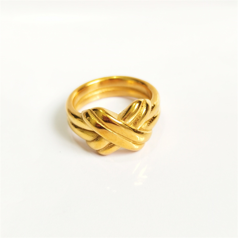 Designer ring stainless steel embossed hollow ins niche cold wind notch irregular wide face female ring surface plating 18K real gold