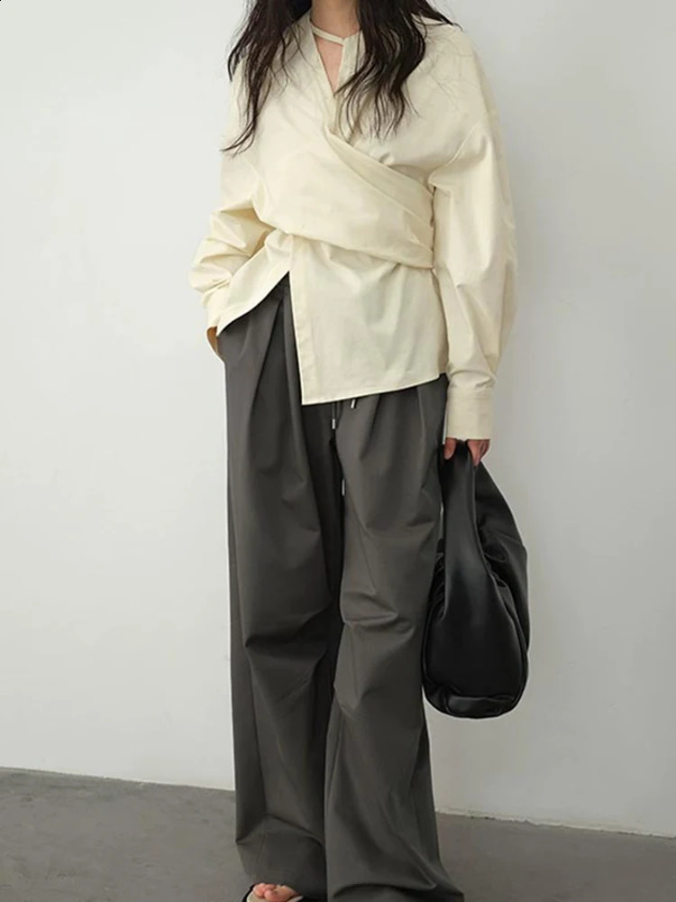 EAM Women Light Yellow Irregular Corss Big Size Elegant Blouse V-neck Long Sleeve Shirt Fashion Spring Autumn 2024 26D4283 240815