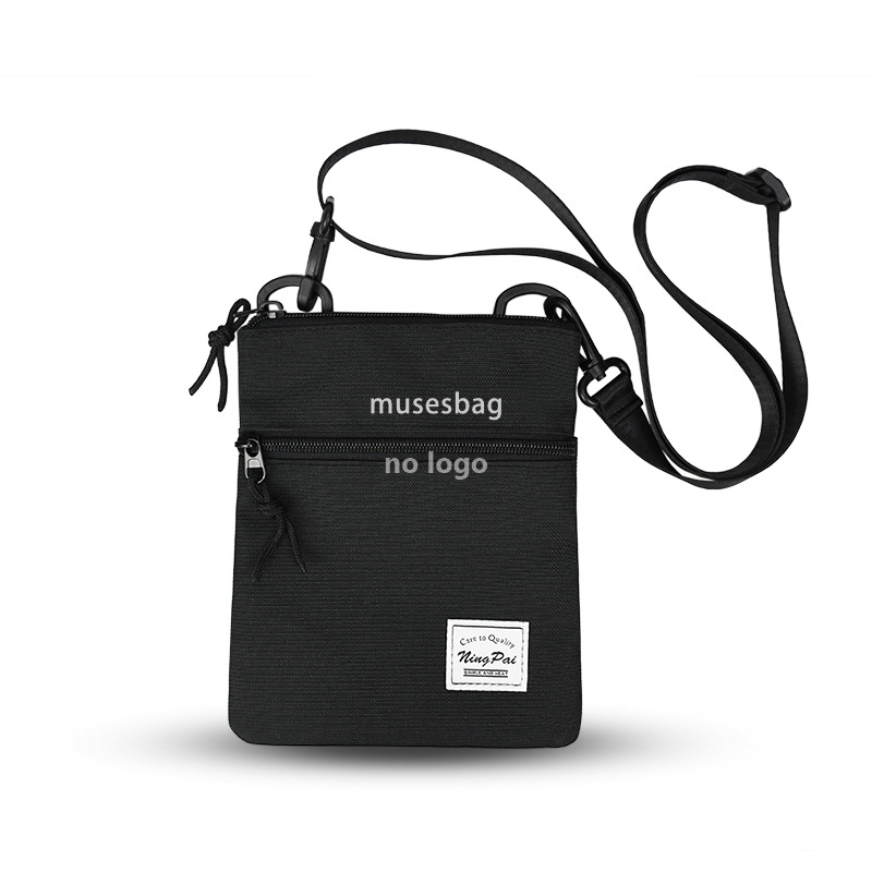 The new black and white checkerboard mobile phone bag simple and versatile lightweight crossbody bag single shoulder classic black storage small squar
