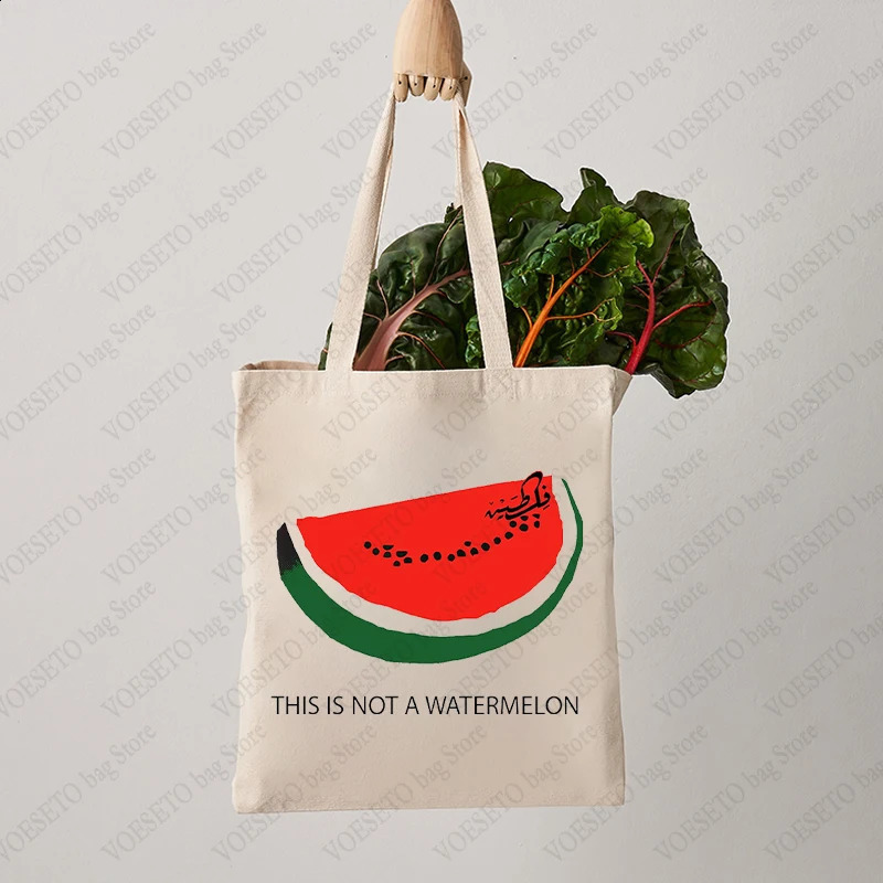 2025 new This Is Not A Watermelon Pattern Tote Canvas Shoulder Bags Against War Womens Reusable Shopping Bag Gift for Peace 240816 zhanyishengli