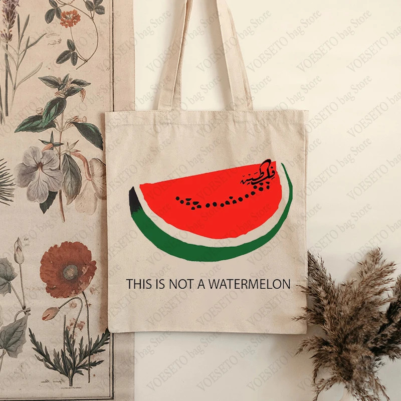 2025 new This Is Not A Watermelon Pattern Tote Canvas Shoulder Bags Against War Womens Reusable Shopping Bag Gift for Peace 240816 zhanyishengli