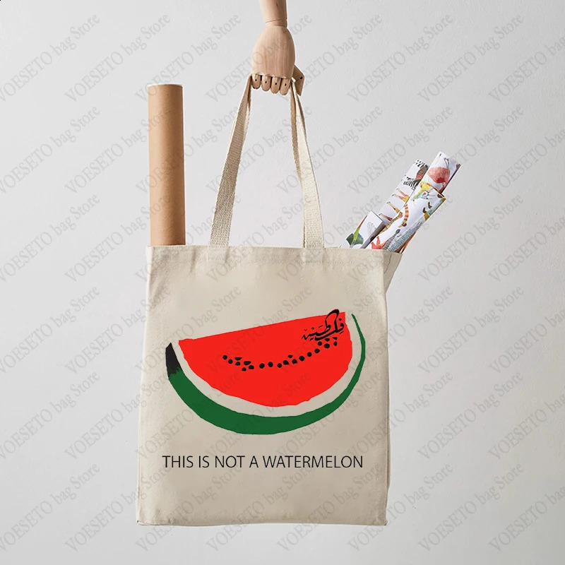 2025 new This Is Not A Watermelon Pattern Tote Canvas Shoulder Bags Against War Womens Reusable Shopping Bag Gift for Peace 240816 zhanyishengli