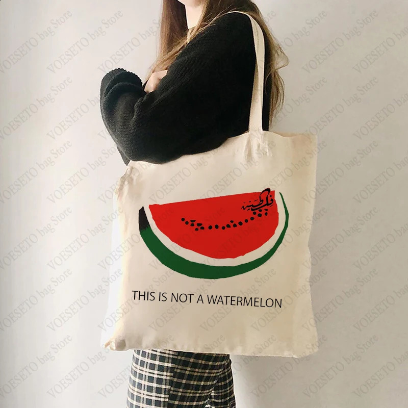 2025 new This Is Not A Watermelon Pattern Tote Canvas Shoulder Bags Against War Womens Reusable Shopping Bag Gift for Peace 240816 zhanyishengli