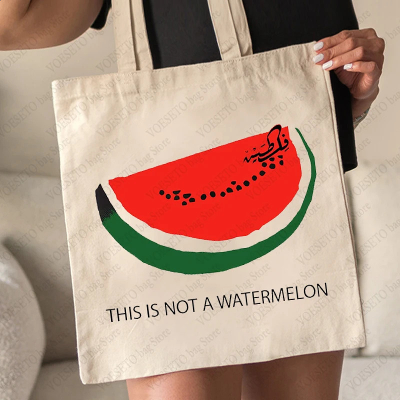 2025 new This Is Not A Watermelon Pattern Tote Canvas Shoulder Bags Against War Womens Reusable Shopping Bag Gift for Peace 240816 zhanyishengli