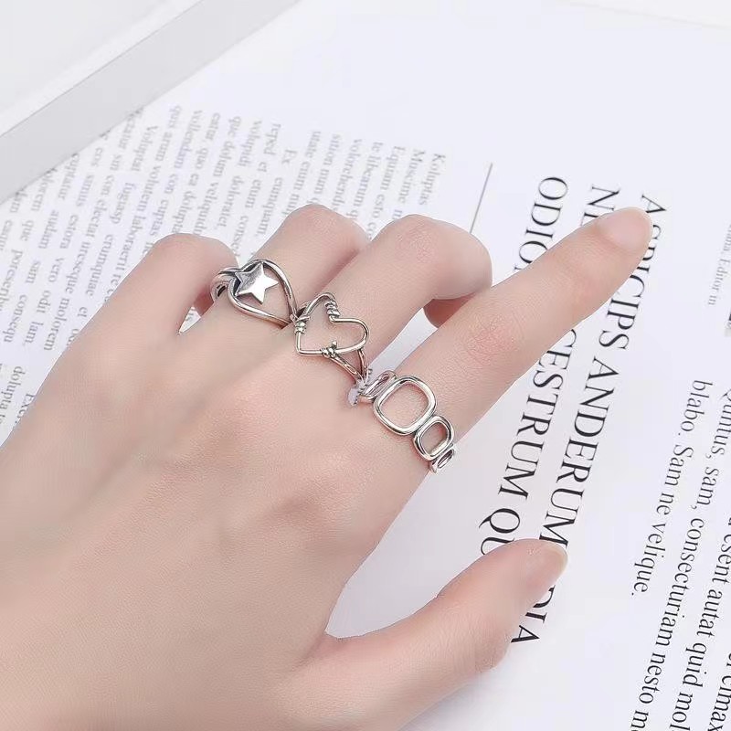 Designer ring copper material personality fashion open finger ring three-piece ring hollow geometric love ring female niche index finger ring