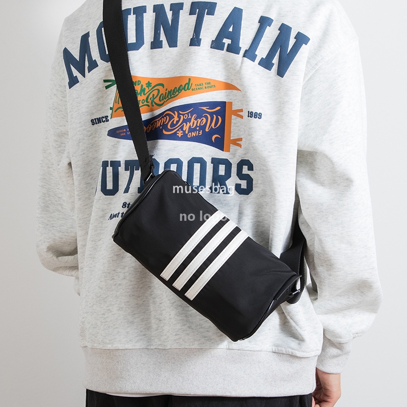 Korean fashion men's and women's cyder personality everything simple mobile phone niche striped small body casual crossbody bag 668a