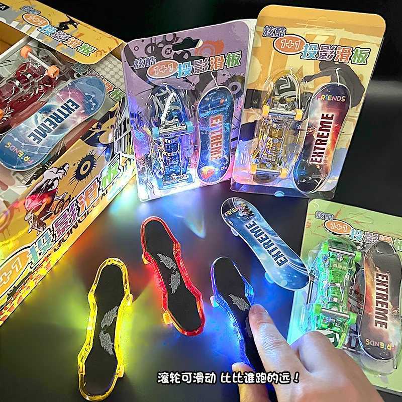 Finger Skateboard Toy Cartoon Animation Mini Fingertip Projection LED Glowing Scooter Childrens Puzzle Table Games Novelty Toys Y240817