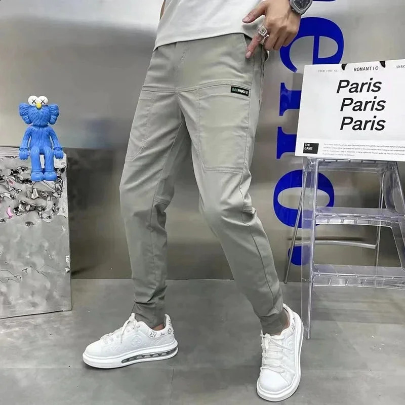 Mens high stretch multi pocket tight cargo pants sports solid color casual outdoor runners Trousers w240816