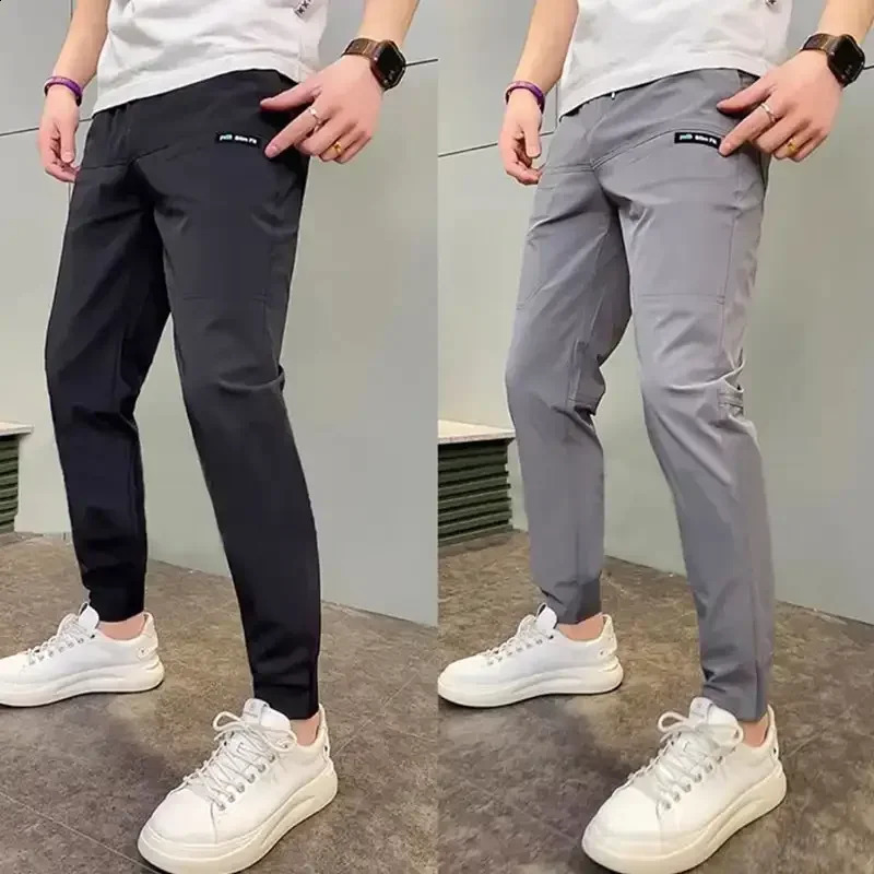 Mens high stretch multi pocket tight cargo pants sports solid color casual outdoor runners Trousers w240816