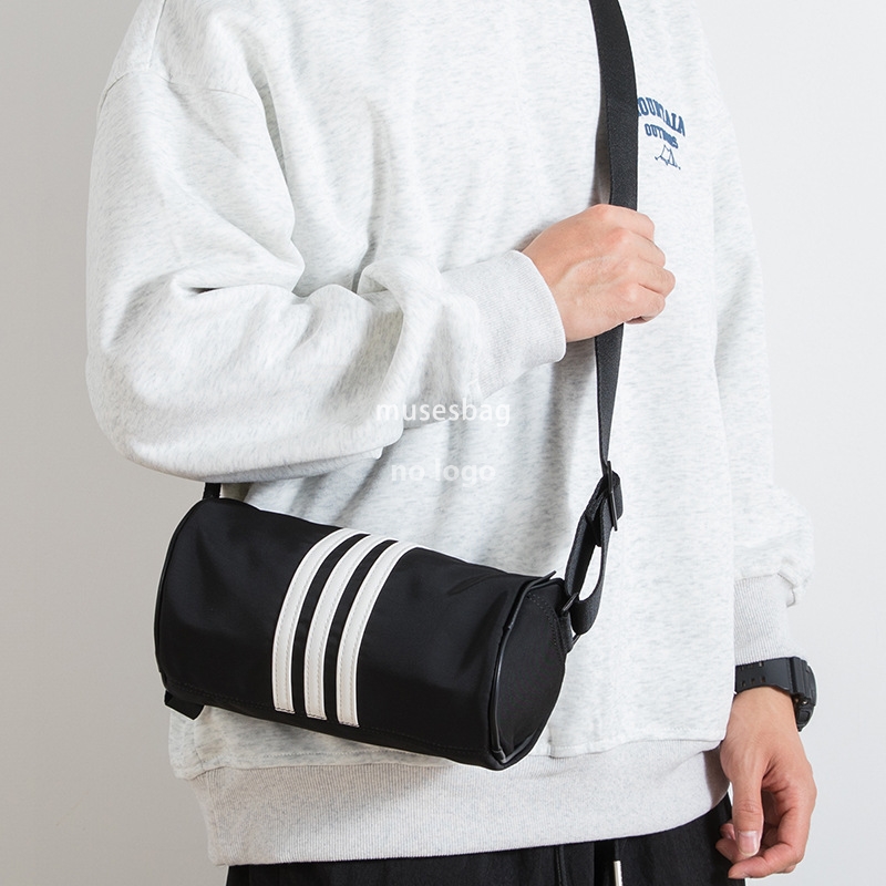 Korean fashion men's and women's cyder personality everything simple mobile phone niche striped small body casual crossbody bag 668a