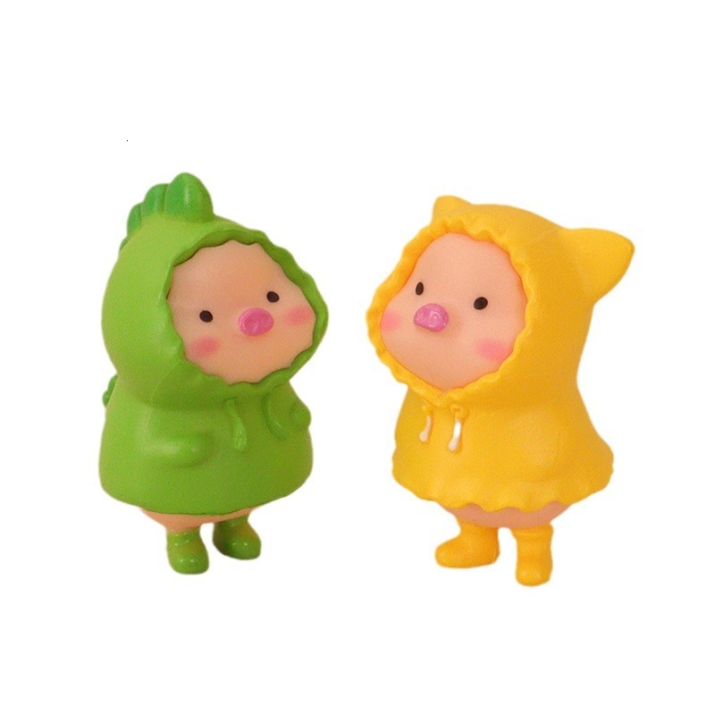 Fun Kid's Rain Coat with Charming Cartoon Scenes of Tiny Homes and Pigs Ideal for Nursery Theme