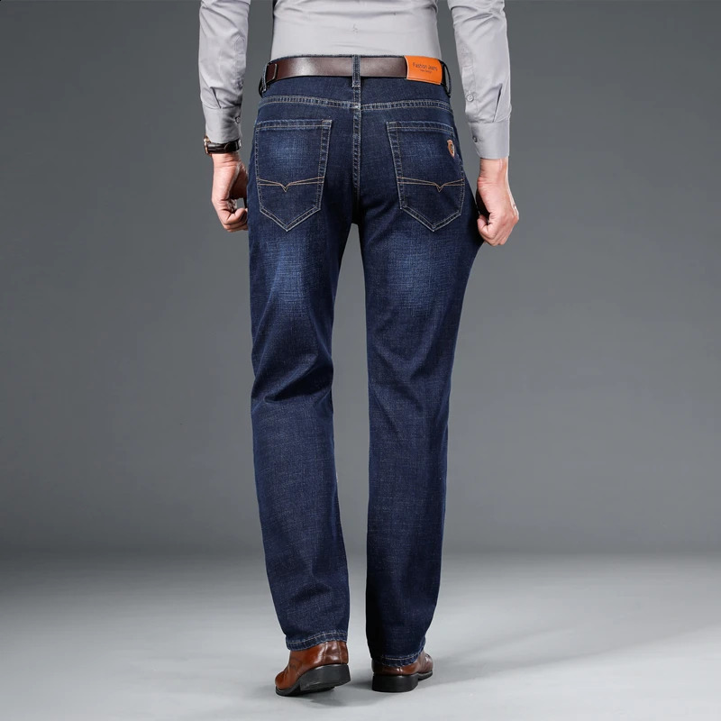 SHAN BAO 2024 autumn spring fitted straight stretch denim jeans classic style badge youth mens business casual trousers 240816