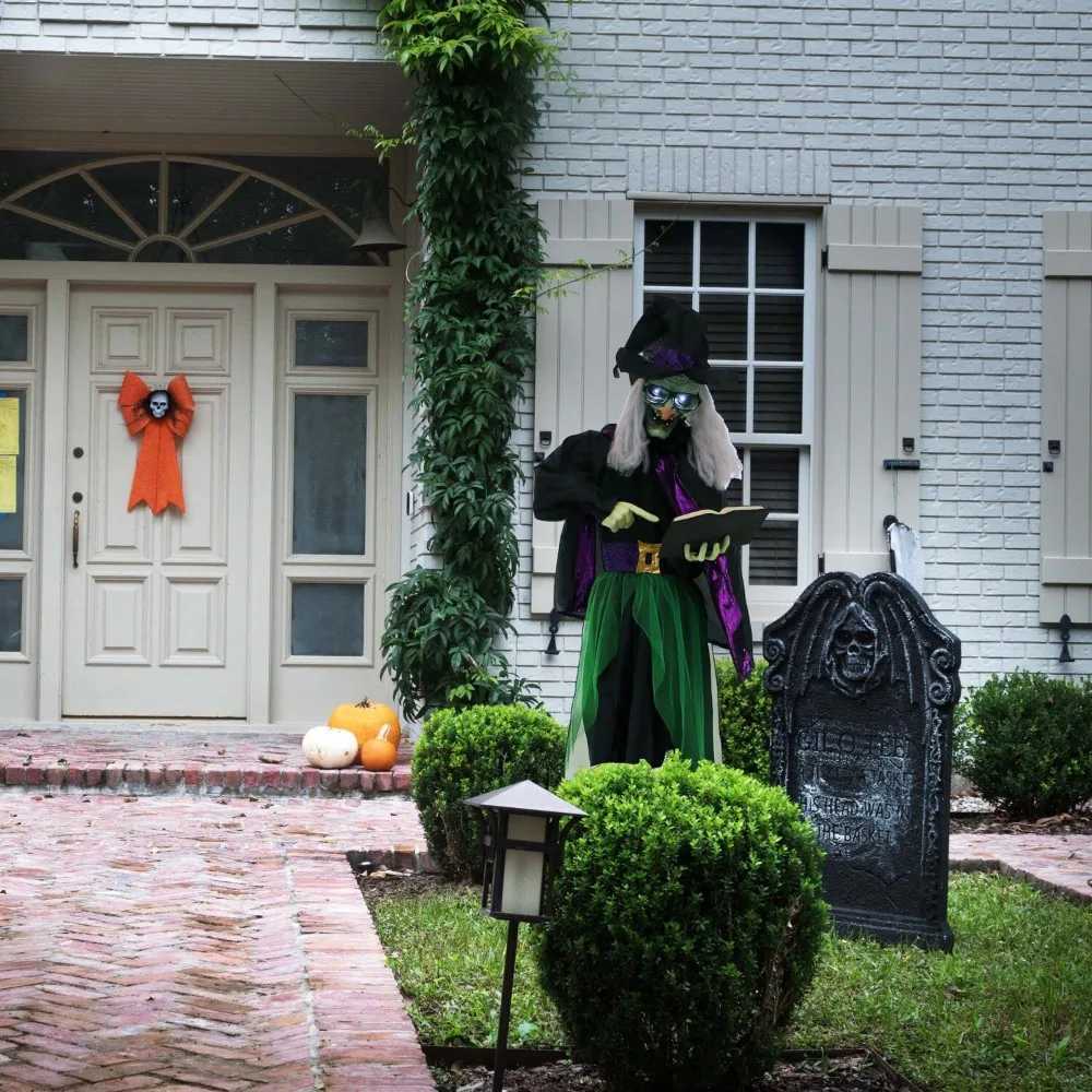 Halloween decoration - a life sized terrifying talking witch holding a magic book Halloween animation with touch activated light and batteryX240817