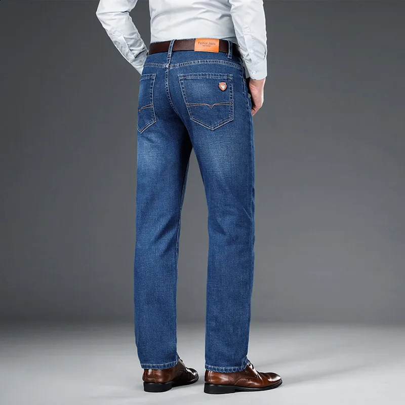 SHAN BAO 2024 autumn spring fitted straight stretch denim jeans classic style badge youth mens business casual trousers 240816