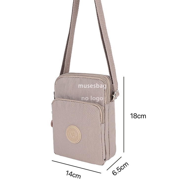 Foreign trade vertical simple bag female Korean version simple zipper single shoulder crossbody vertical version nylon mobile phone bag wholesale