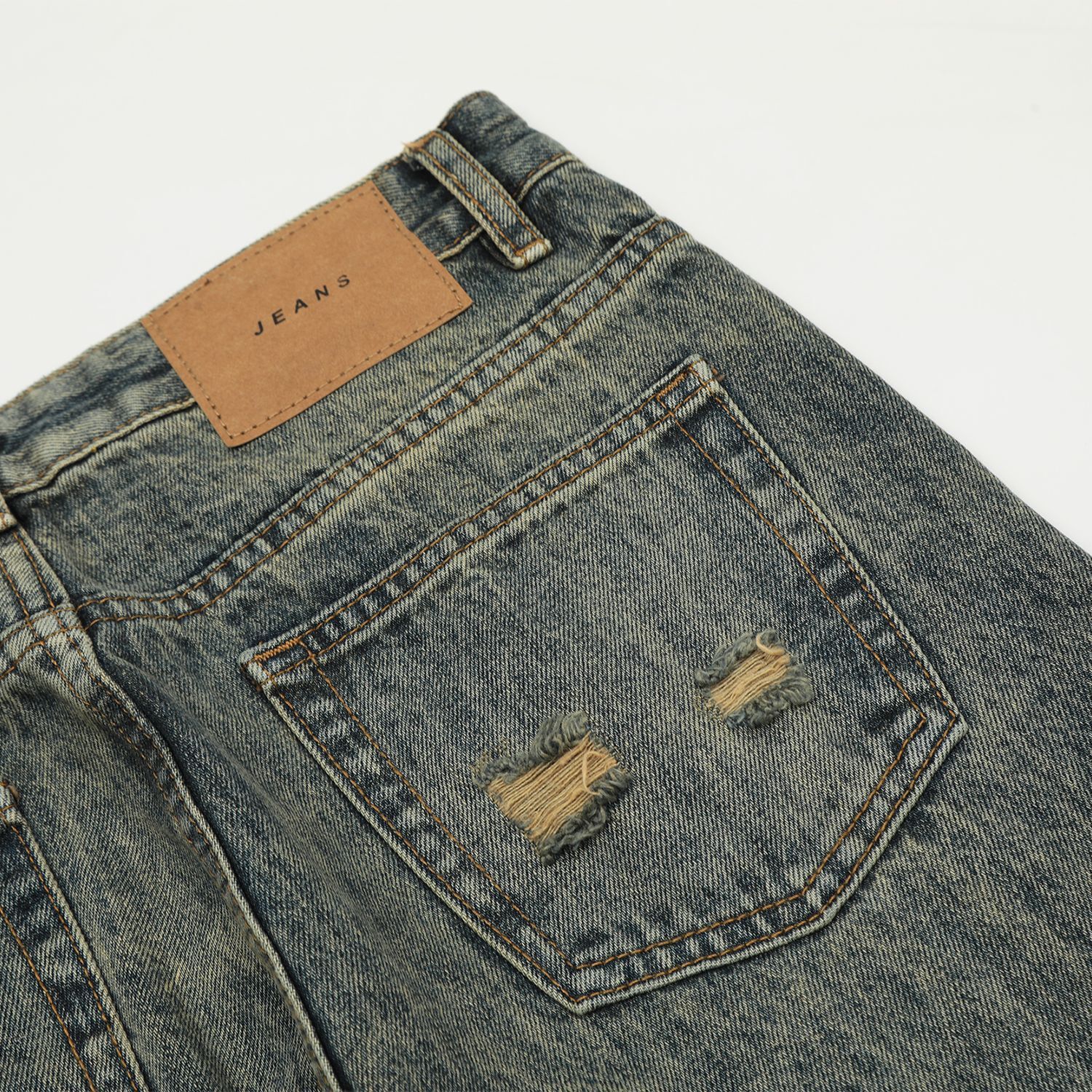 American Street Yellow Mud Washed and Worn Denim Jeans with a Slimming and Sagging Feel for Both Men and Women