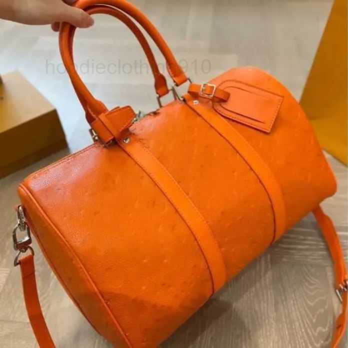 Totes High quality Hot designer duffle bag Men women fashion travel Large capacity Zipper open and close coated canvas leather hand bill shoulder crossbody bag 7A.