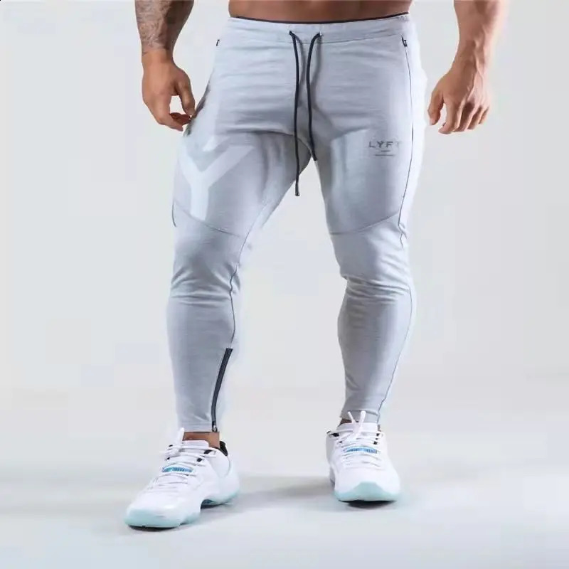 LYFT Fitness Pants for Mens Spring and Autumn Breathable Sports and Casual Pants Slim Fit Small Foot Zipper Guard Pants 240819