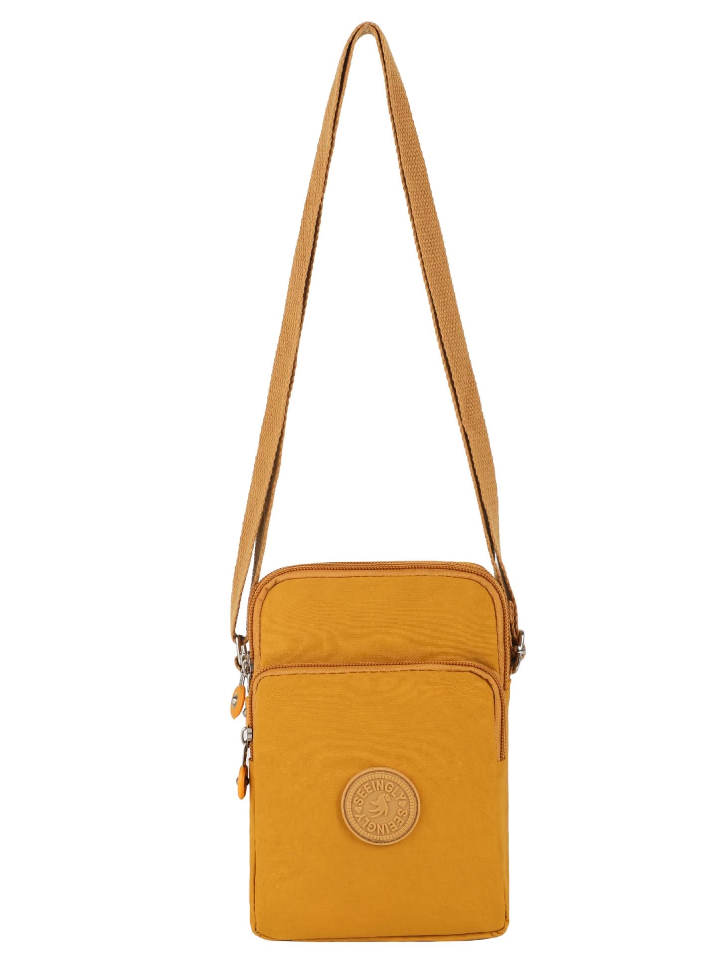 Foreign trade vertical simple bag female Korean version simple zipper single shoulder crossbody vertical version nylon mobile phone bag wholesale