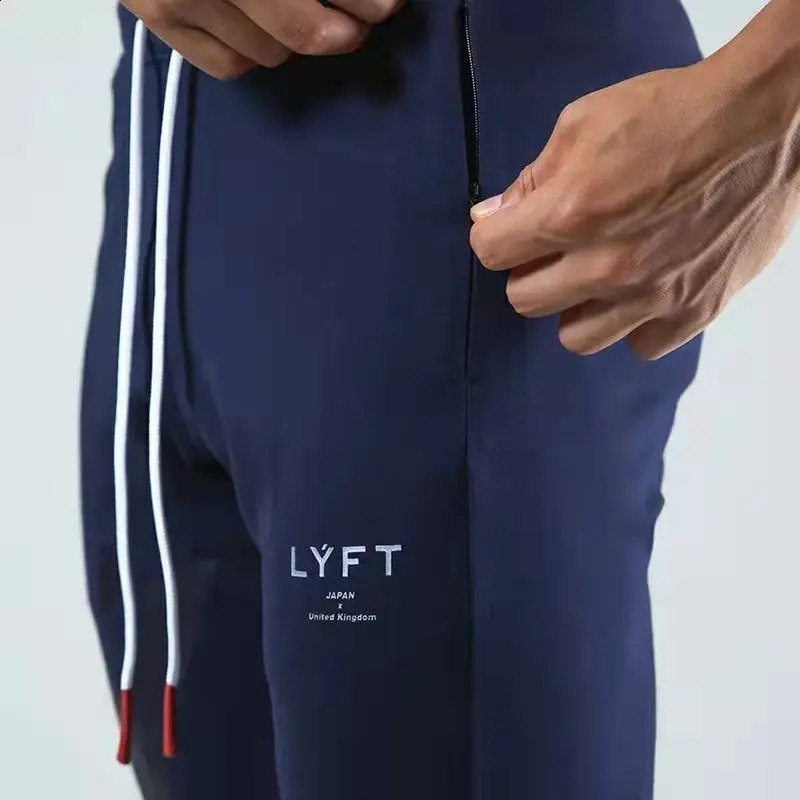 LYFT Fitness Pants for Mens Spring and Autumn Breathable Sports and Casual Pants Slim Fit Small Foot Zipper Guard Pants 240819