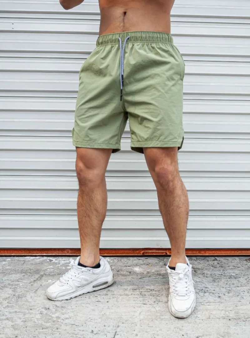 Summer new Men Light Weight Thin Short Pants Running Squat Fitness Shorts Men GYM Wear Quick-drying Beach Drawstring ShortsXJ250213