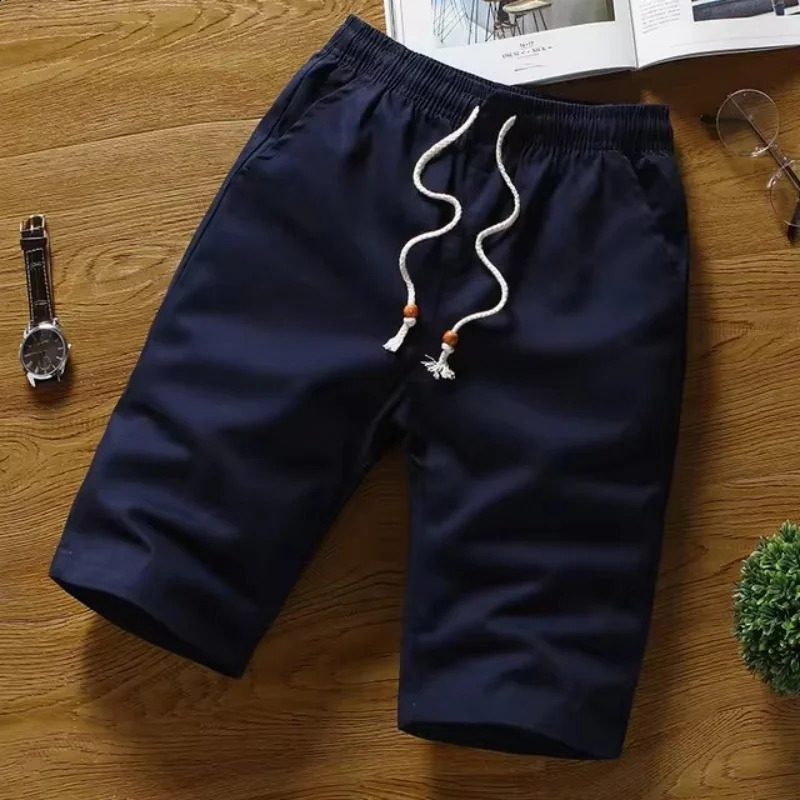 Summer pure cotton mens casual solid color shorts straight tube loose breathable elastic waist with bead tie rope 240819