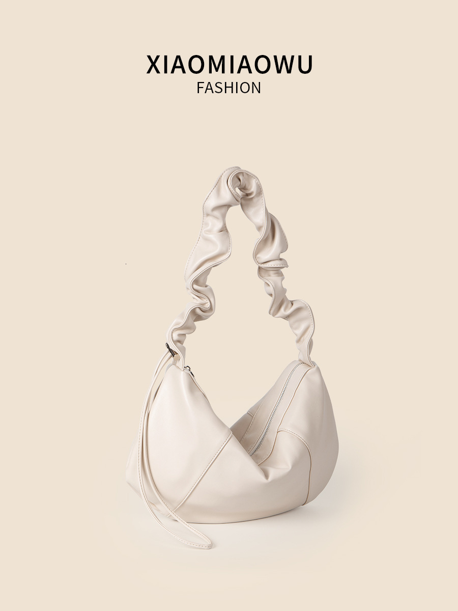 Wrinkled shoulder strap soft leather commuting female students, fashionable large capacity crossbody bag for women, versatile summer style