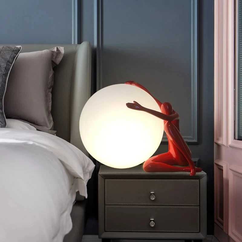 Nordic art floor lamp abstract decoration of human figure holding ball vertical lamp creative figure sculpture decorative table Y240820