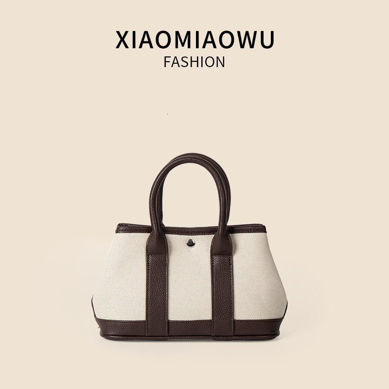 Minimally artistic versatile crossbody canvas shoulder bag, niche summer light luxury high-end women's hand-held vegetable basket bag