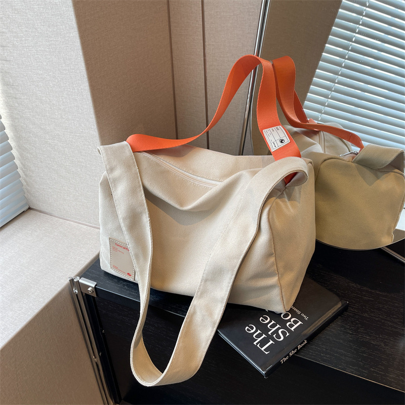 Simple and stylish crossbody tote online red envelope women's 2024 new casual canvas bag, large capacity shoulder bag