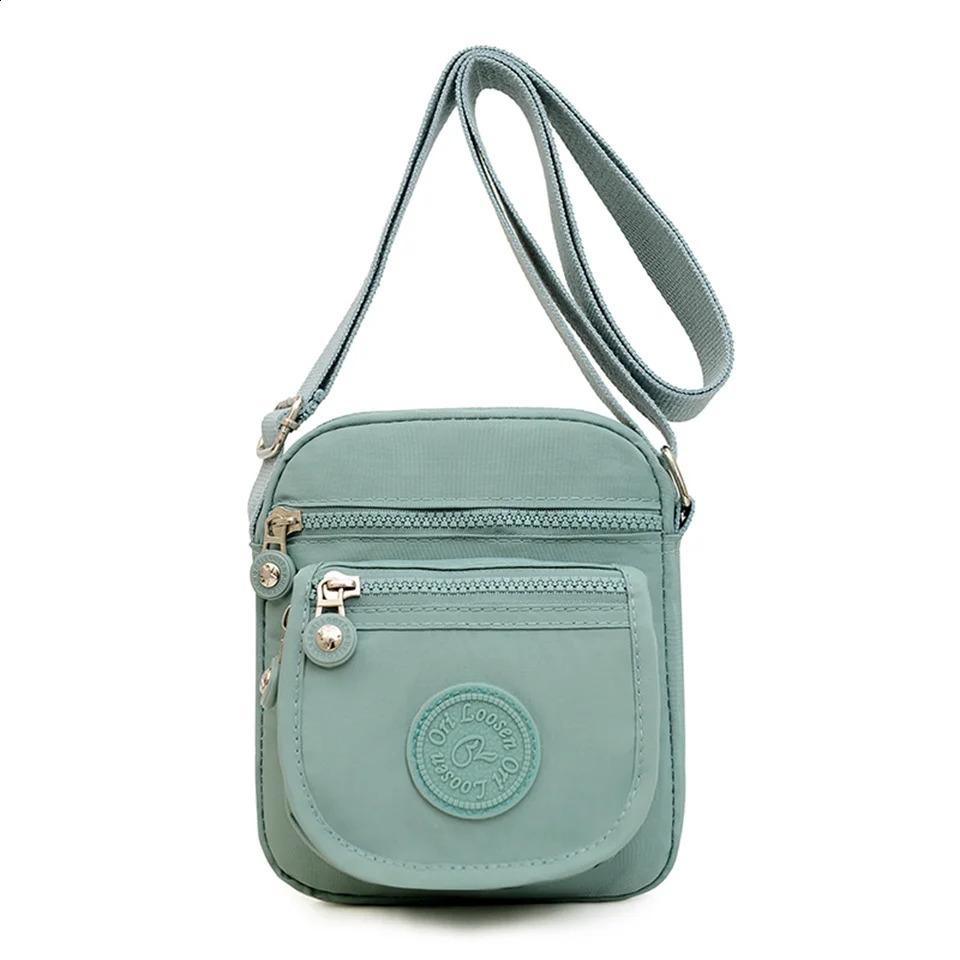 Womens fashionable solid color zipper waterproof nylon shoulder bag womens waterproof travel messenger bag 240819