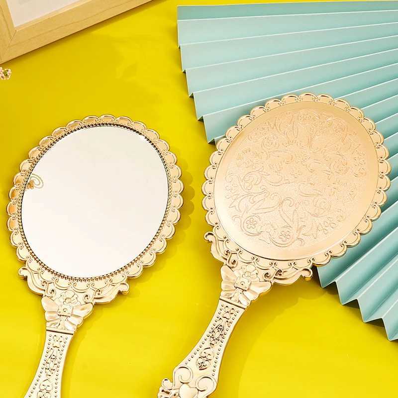 Rose Gold Portable Vintage Makeup Mirror Hand Hold Oval Round Mirror Noble Restore Ancient Ways Court Mirror Beauty Tool Y240819