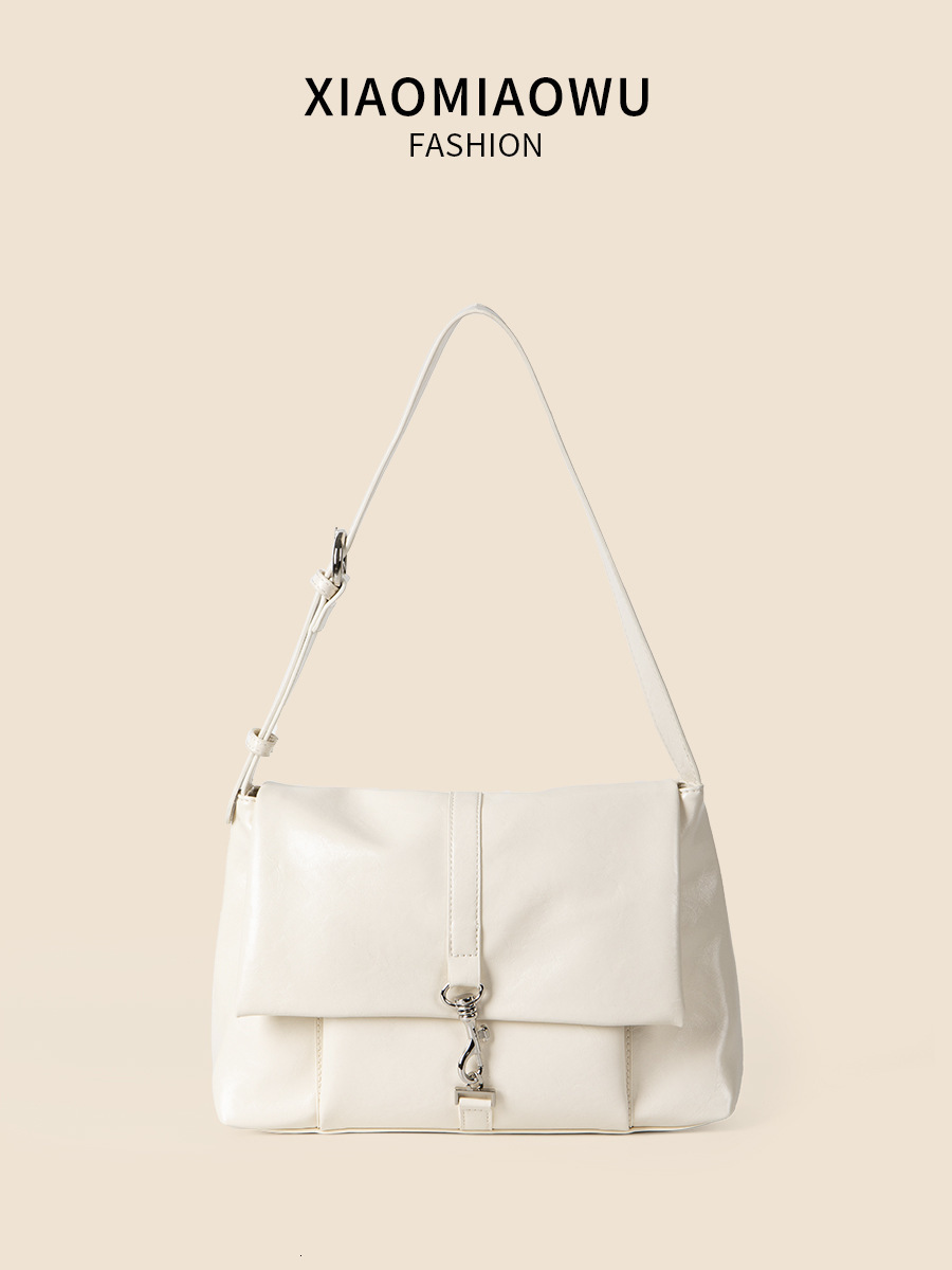 2024 New Soft Face Oil Wax Leather Feel Shoulder with Large Capacity, Versatile Commuting, Fashionable Lock Buckle, and Postman Bag