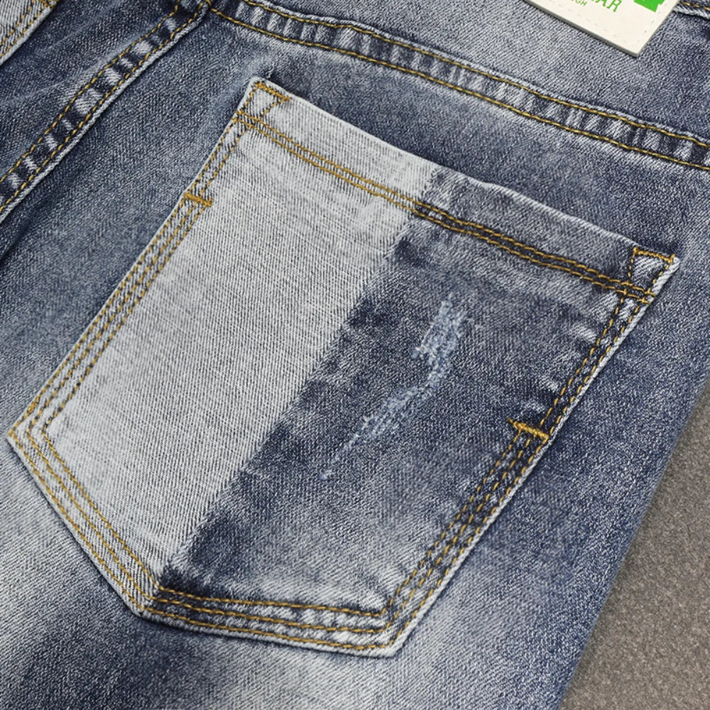 Autumn fashion handsome personality retro patchwork jeans mens old patch holes Ripped jeans pants cargo pantalones hombre 240819
