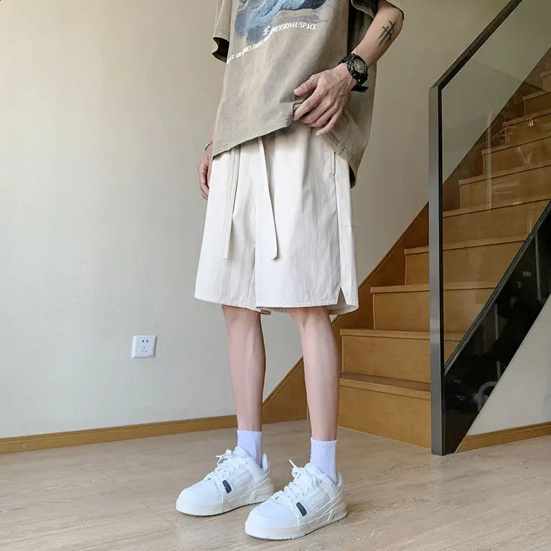 Summer mens solid color pocket elastic high waisted knee pants wide leg British style loose drawstring shorts 240819