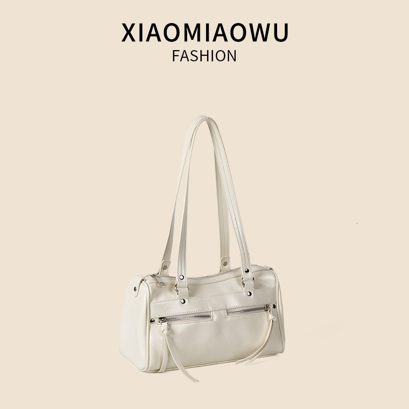 Summer new multi pocket pillow niche and personalized commuting shoulder bag, women's large capacity high-end motorcycle bag