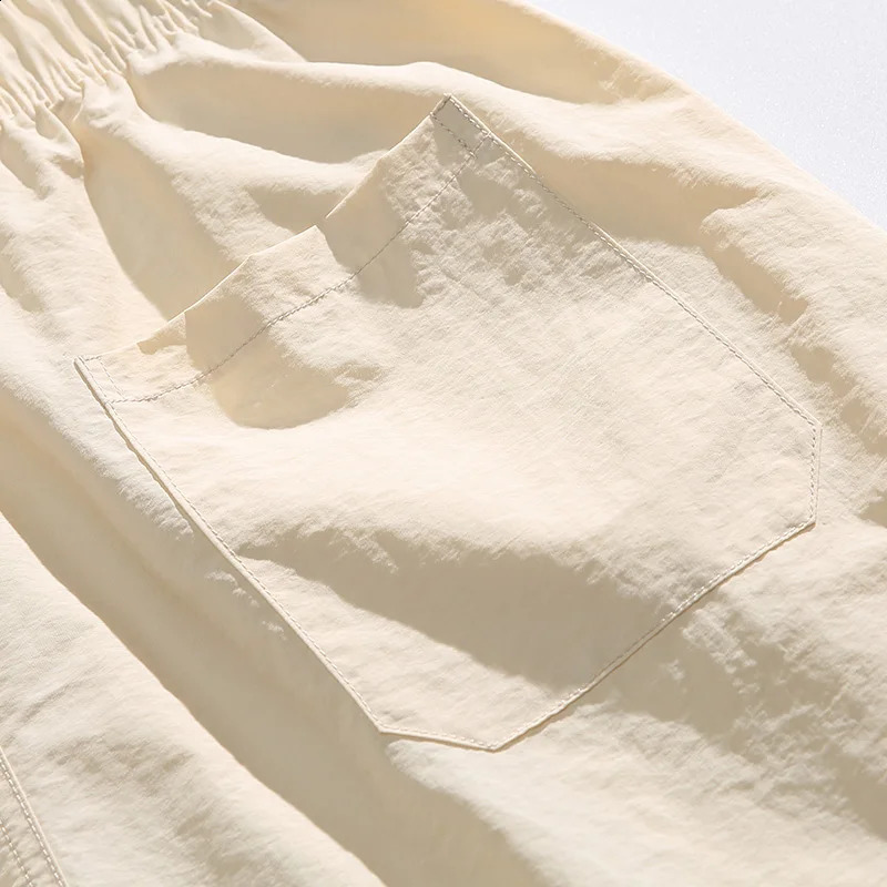 Japanese retro polyamide fabric mens summer thin five point beach pants bathroom 240819