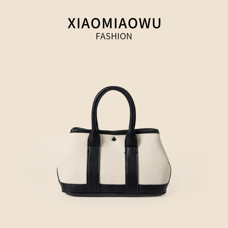 Minimally artistic versatile crossbody canvas shoulder bag, niche summer light luxury high-end women's hand-held vegetable basket bag