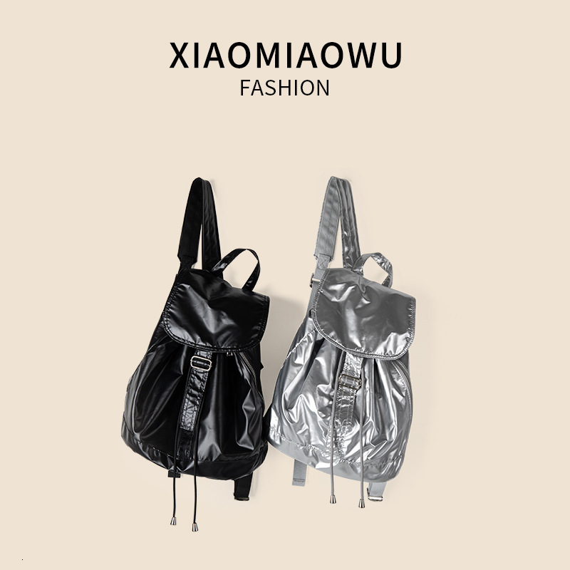 Korean version shiny silver drawstring high-end feel, light travel large capacity backpack, university women's minimalist